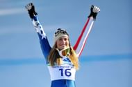 Vonn of the United States celebrates winning the gold medal during the flower ceremony for the Alpine Skiing Ladies Downhill on day 6 of the Vancouver 2010 Winter Olympics at Whistler Creekside on February 17, 2010 in Whistler, Canada. (Photo by Clive Mason/Getty Images)